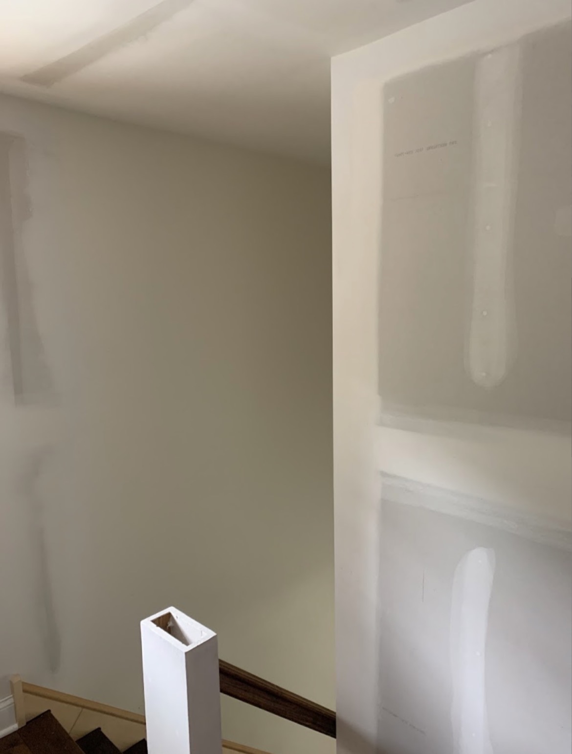 Stairwell with smooth taped and finished drywall